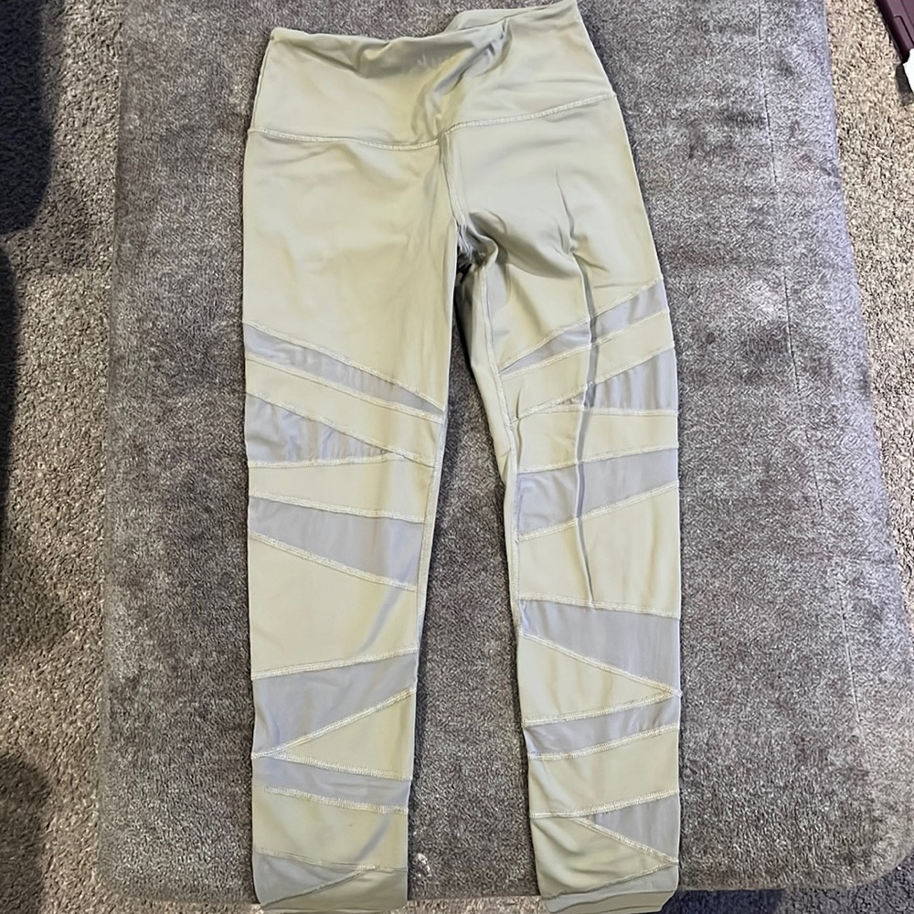 Army green with mess cut outs on the leg, VS sport leggings